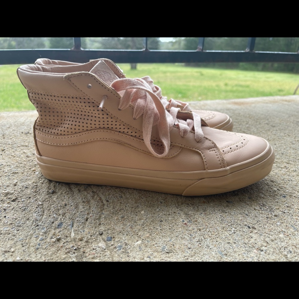 Womens Vans size 9.5. Creamy tan  in color. Only work a few times.
